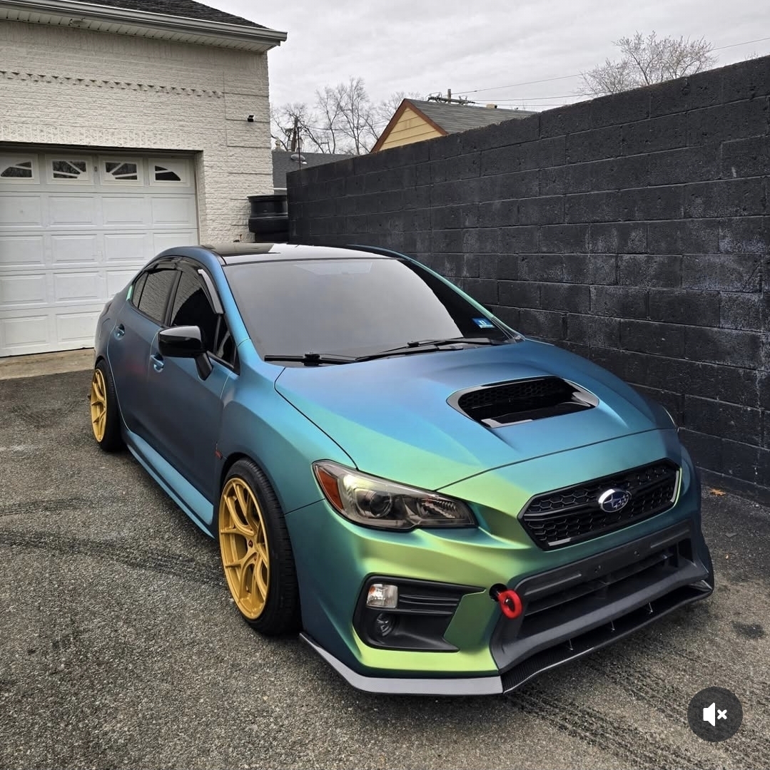 Color-shift Subaru WRX STI photographed in the studio